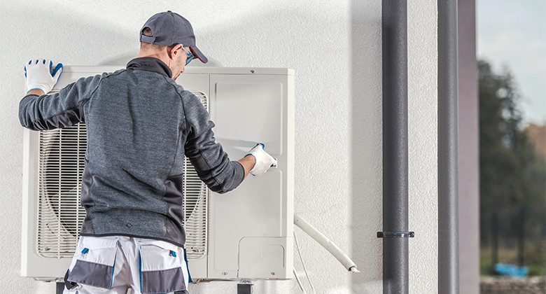 Heat Pump Installer Installing Heat Pump